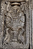 Prambanan - Candi Lara Jonggrang, kinara-kinari panels a composition of a lion with the tree of heaven and a pair of kinnara. 